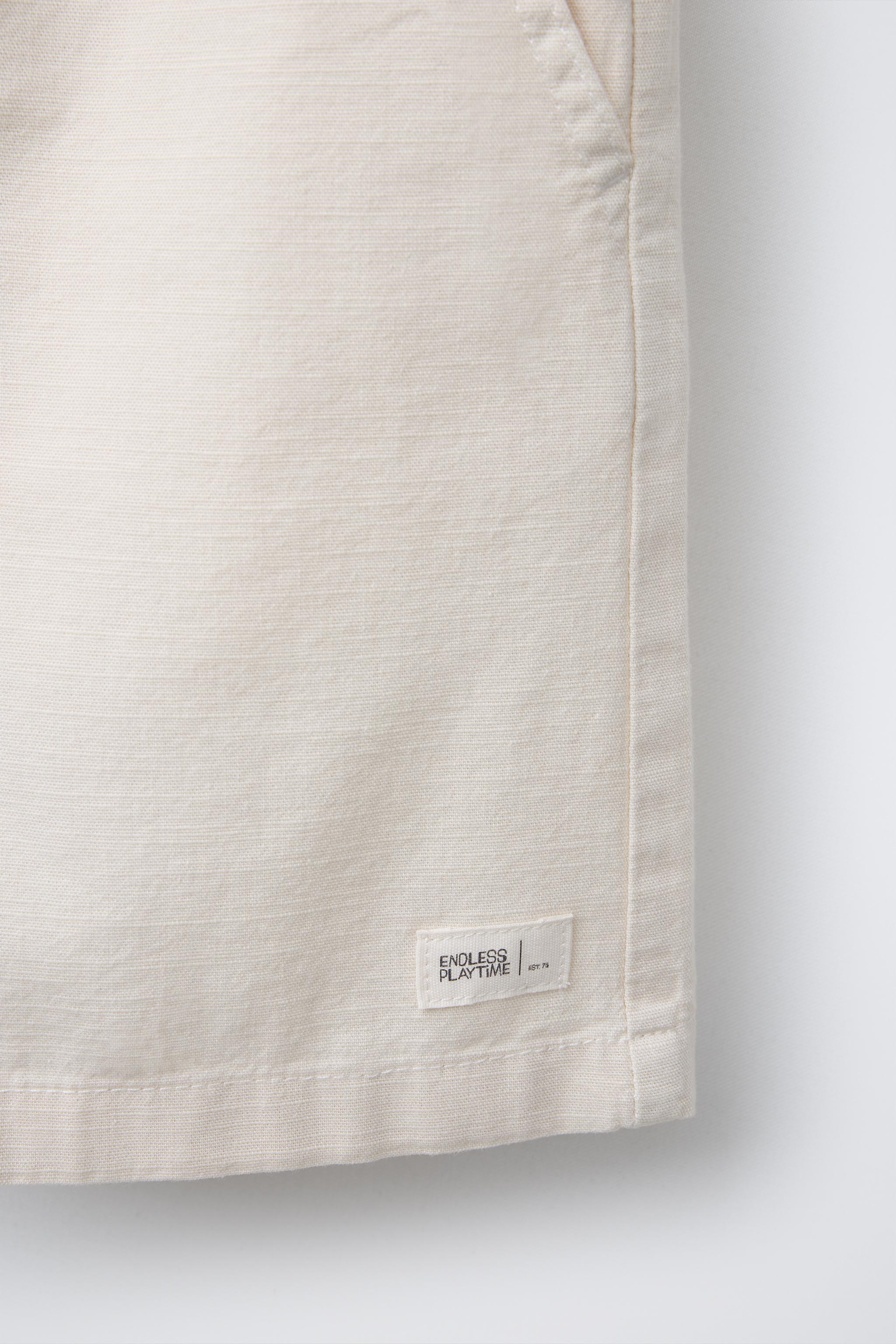 WIDE FIT COTTON SHORTS WITH LABEL